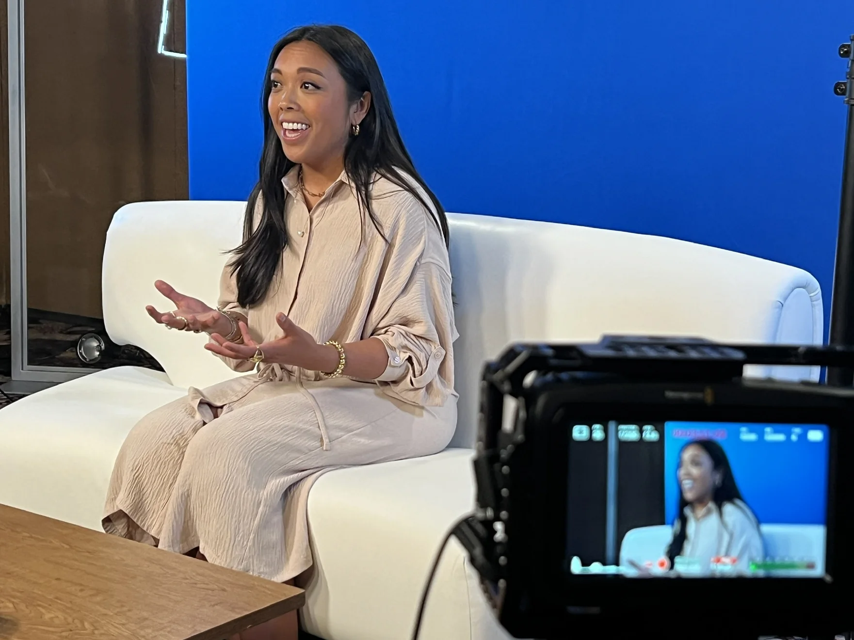 Dr. Lexi Gonzales on the IFM on-camera set, mid-conversation
