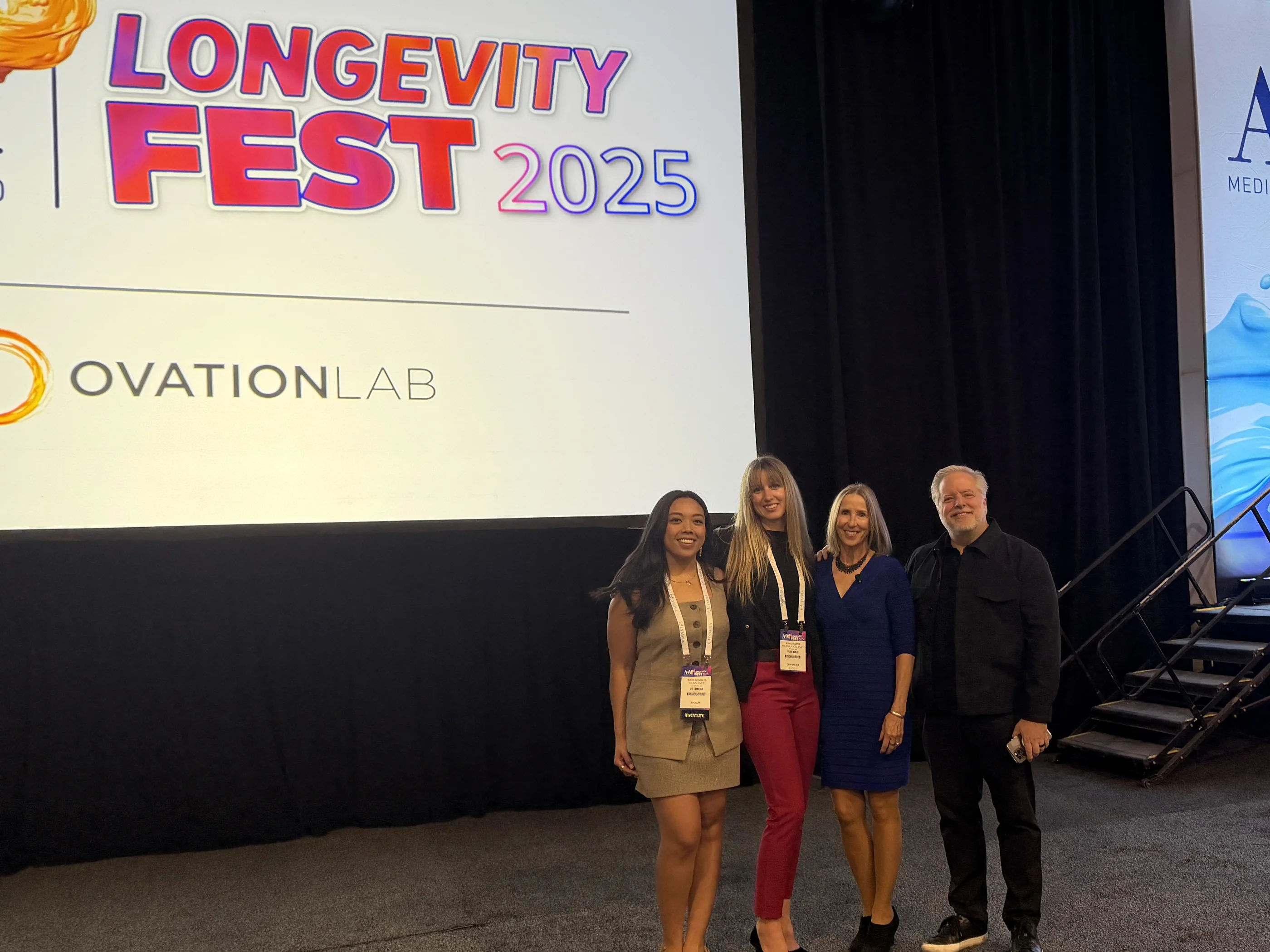 Dr. Lexi Gonzales with the OvationLab team on stage at LongevityFest 2025